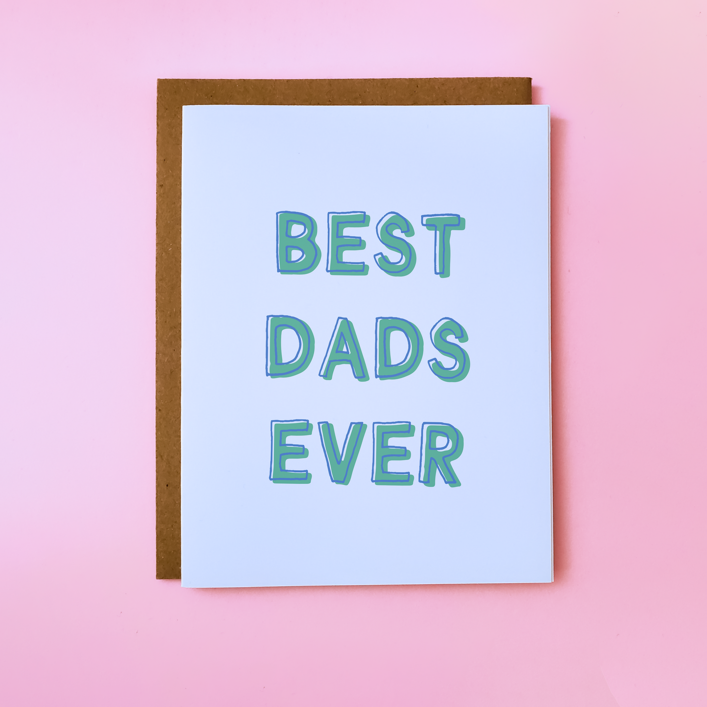 Image shows a LGBTQ Parent Card on pink background. Gay Father's Day Card reads 'Best Dads Ever'.