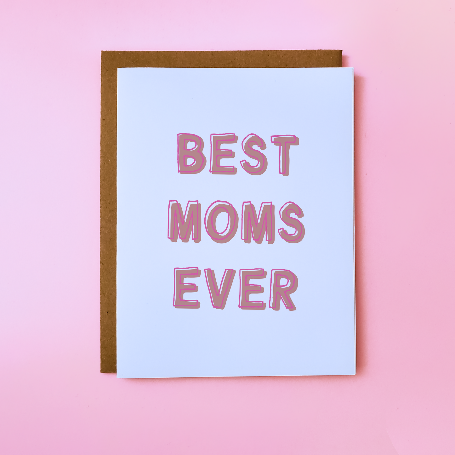Image shows a LGBTQ Parent Card on pink background. Lesbian Mother's Day Card reads 'Best Moms Ever'.