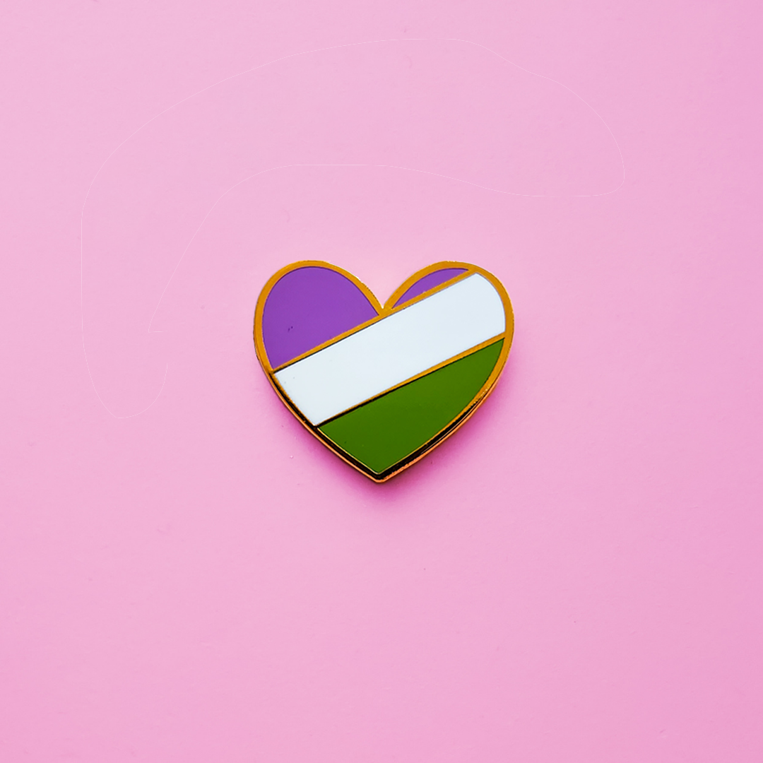 Heart-shaped Genderqueer Pride Pin on a pink background. This Genderqueer Pin or gender-fluid pin is has vibrant gender queer pride colours set in a polished nickle metal. Gender queer pride pin colours are purple, white and green. Genderqueer Heart Pin - LGBTQ Pride Pins | Little Rainbow Paper Co